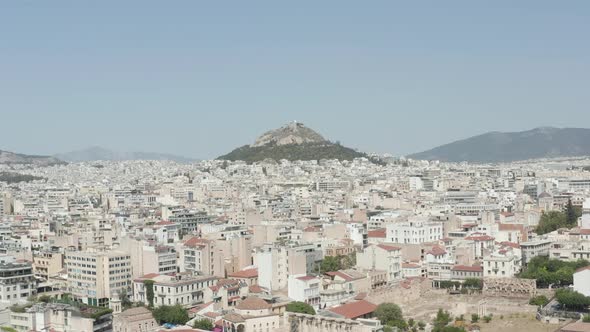 Slow Establishing Dolly Aerial Towards Mount Lycabettus in Athens, Greece alt