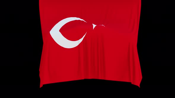 The piece of cloth falls with the flag of the State of Turkey to cover the product or item behind th alt