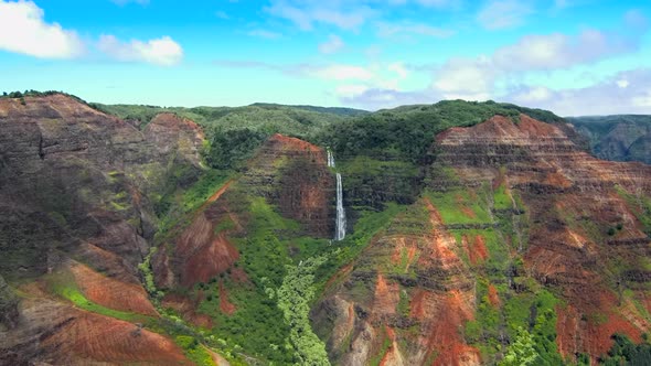 Aerial view of jurssic falls at Waimea Canyon In Kauai Island alt