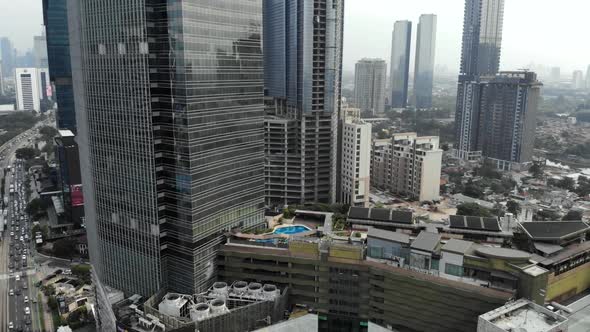 Cinematic citycape aerial view, overhead view of buildings and skyscrapers in a city.