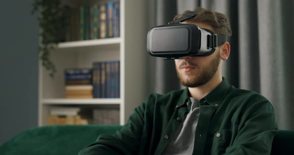 Man in VR Headset at Home