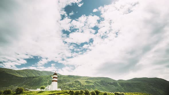 Alnesgard, Godoya, Norway. Old Alnes Lighthouse In Summer Day In Godoy Island Near Alesund Town alt