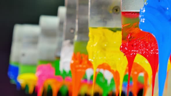 Red And Yellow Ink Are Hang On Handle Printer. alt