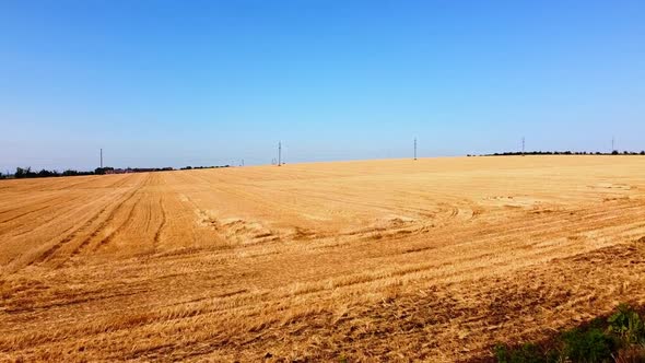 Aerial drone view of a flying over the rural agricultural landscape. alt