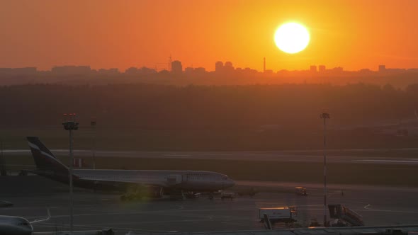 Sunset over city and airport view. Moscow, Russia alt