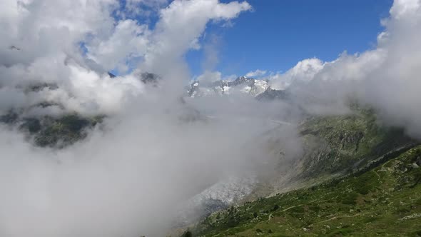 Time-lapse scene with Great Aletsch Glacier in national park Switzerland alt