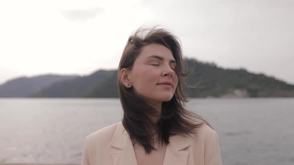 Portrait of a beautiful young woman on vacation enjoying an Asian summer holiday in Marmaris Turkey. alt