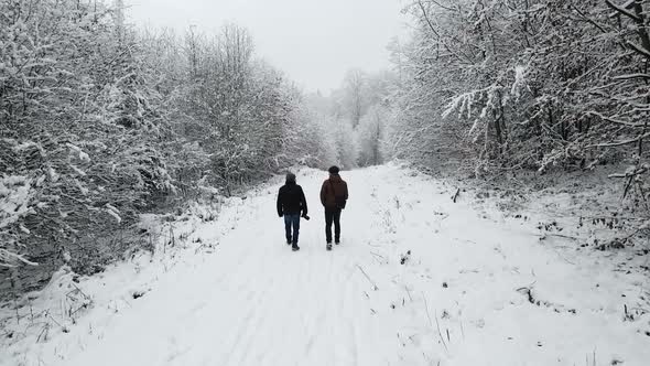People walking in snow alt