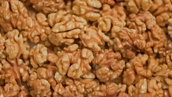 Looped Spinning Walnuts Without the Shell Closeup Full Frame Background
