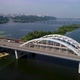 Aerial top view of automobile and railroad Darnitsky bridge across Dnieper river from above. - VideoHive Item for Sale