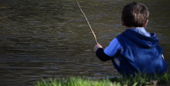 Child Playing With Water