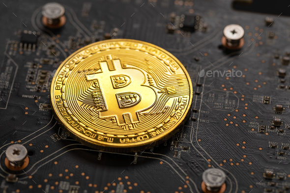 Gold bitcoin on crypto mining GPU circuit board computer hardware