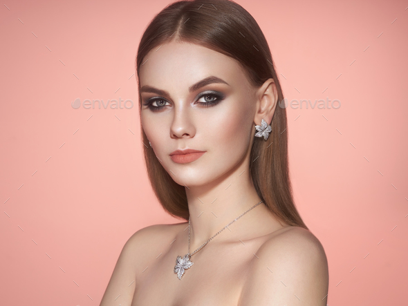 Brunette woman with long shiny smooth hair - Stock Photo - Images