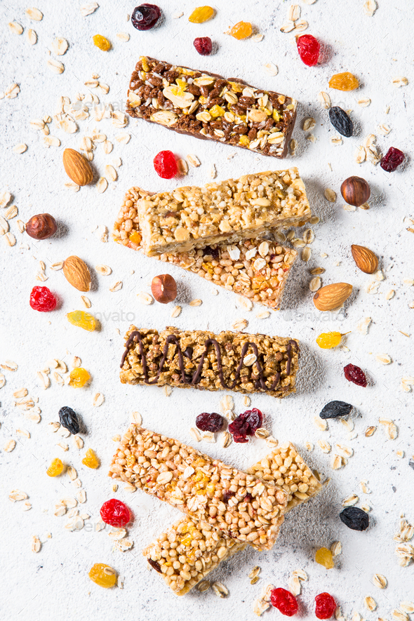 Download Granola Bar With Nuts Fruit And Berries On White Stock Photo By Nadianb