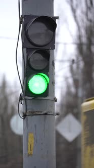 Vertical Video of a Traffic Light on the Road alt