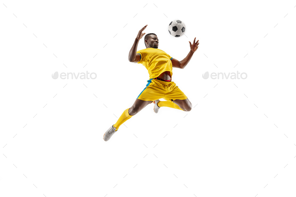Professional african football soccer player isolated on white background - Stock Photo - Images