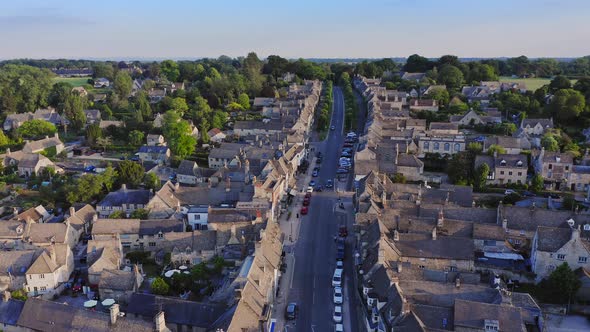 UK Housing Market, Aerial Drone View of Houses in Village of Burford in Cotswolds, England, a Popula alt