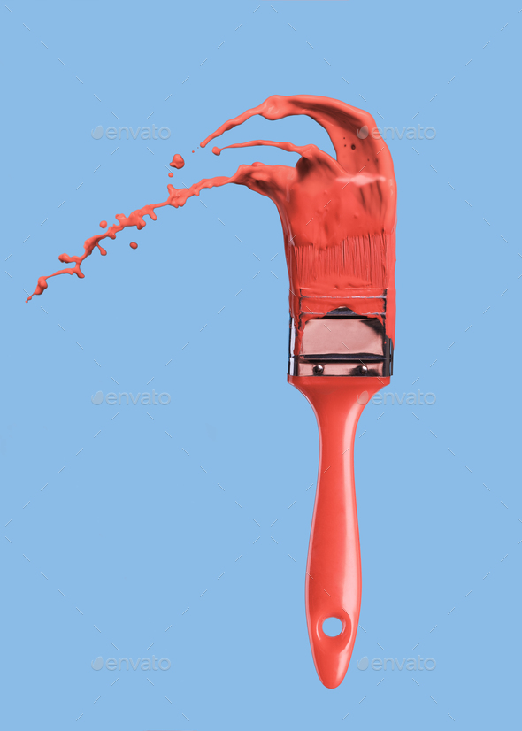 Paintbrush with liquid paint in a color of the year 2019 Living Coral Pantone in color isolated on a - Stock Photo - Images
