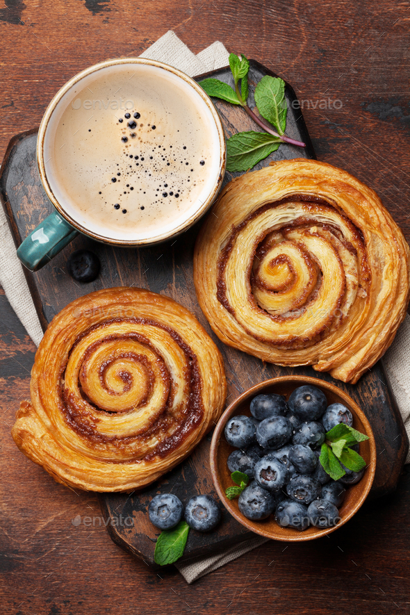 Coffee And Cinnamon Rolls Stock Photo By Karandaev Photodune