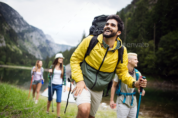 Habubu ondsindet Byttehandel Group of young friends hiking in countryside. Multiracial happy people  travelling in nature Stock Photo by nd3000