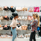 Two ladies at the showcase in lingerie department Stock Photo by