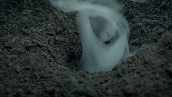 Smoke Rising Out Of Hole In The Earth alt