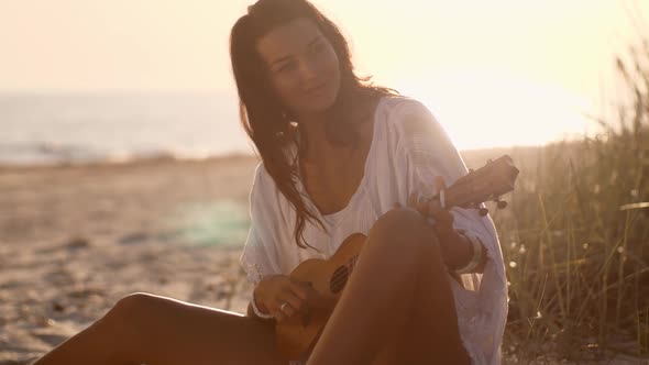 Woman with Ukulele Beach Summer Holiday Vacation alt