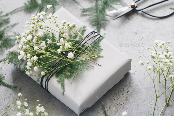Wrapping gifts, florist workshop, photo set. Close up.