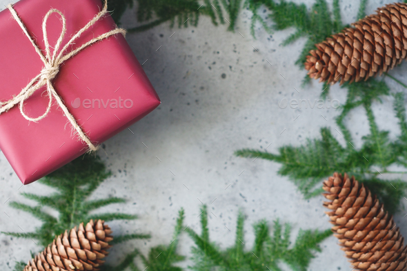 Wrapped Christmas presents with decoration in snow. Flat lay of