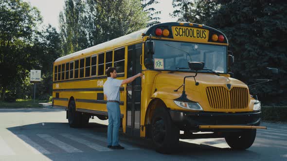 Man Driver Coming Up Schoolbus Press Button Alone alt