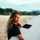 Surfer girl on beach - PhotoDune Item for Sale