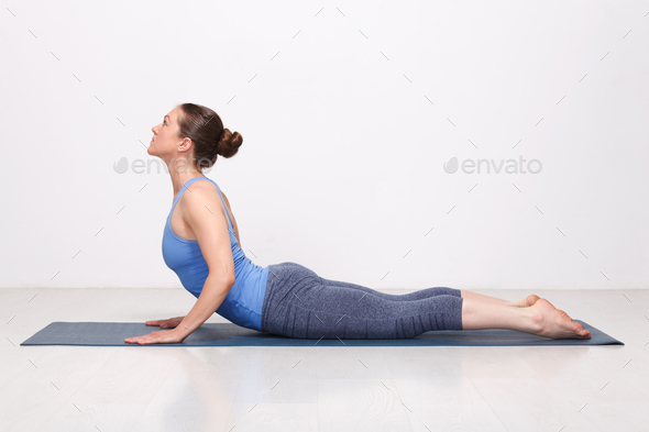 Boy in cobra yoga pose bhujangasana Royalty Free Vector