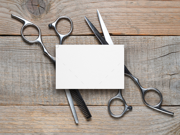 Vintage Hairdressing Scissors And Blank Business Card On Wooden