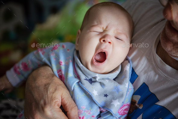 little girl yawning