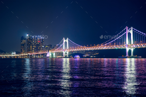 Gwangan Bridge and skyscrapers in the night. Busan, South Korea - Stock Photo - Images
