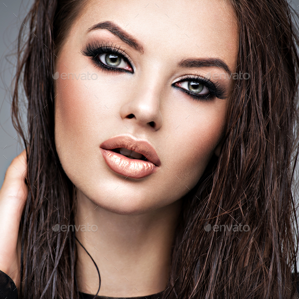 Beauty face of the young beautiful woman - Stock Photo - Images