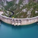 Bird&#39;s Eye View of Dam with Sky Blue Water in Mountains - VideoHive Item for Sale