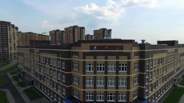 the exterior of the new modern school in the modern residential district,exterior alt