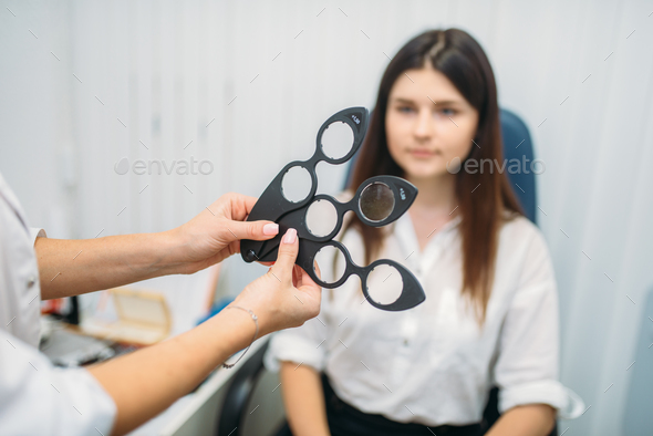 Choice of lens, patient on diagnostic of vision - Stock Photo - Images