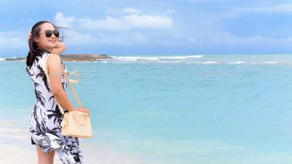 Woman tourist on the beach in Thailand - Stock Photo - Images