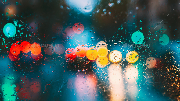 Drops Of Rain Water In Night Or Evening Street Lights On Blue Gl - Stock Photo - Images