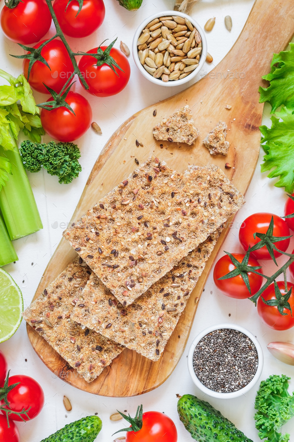 Rye crispbreads and vegetables - Stock Photo - Images