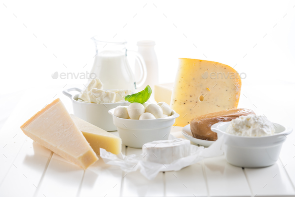 Variation of dairy products on white background Stock Photo by Brebca