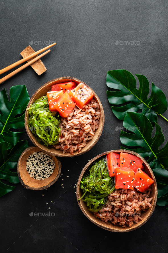 Download Poke Bowl With Raw Salmon Fish Chuka Salad And Rice In Coconut Bowls On Black Background Stock Photo By Sea Wave