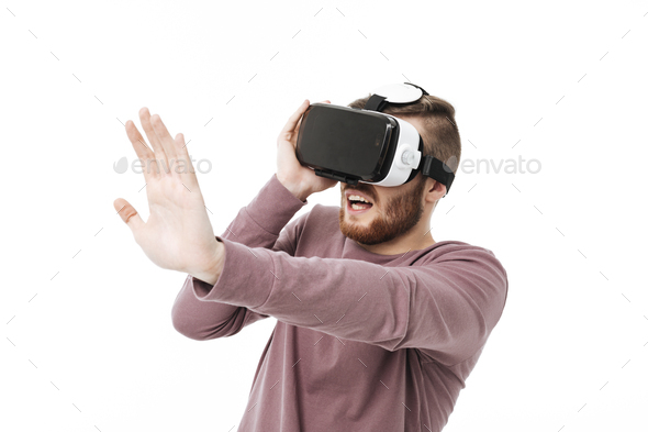 Cool boy playing with visual reality glasses and showing stop gesture isolated - Stock Photo - Images