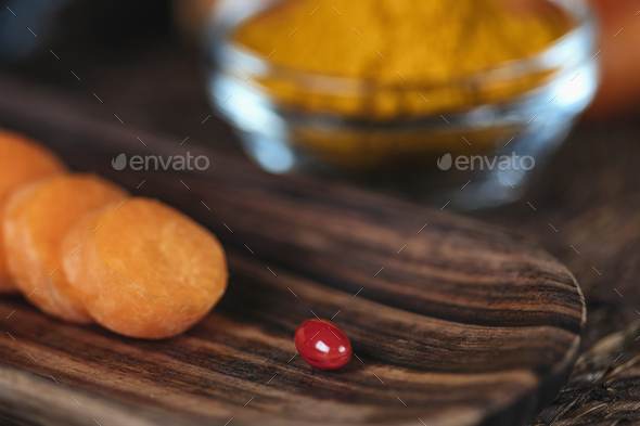 Beta Carotene Supplement Pills and Vegetables - Stock Photo - Images