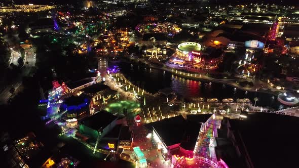 Night landscape of colorful amusement park at downtown Orlando United States alt