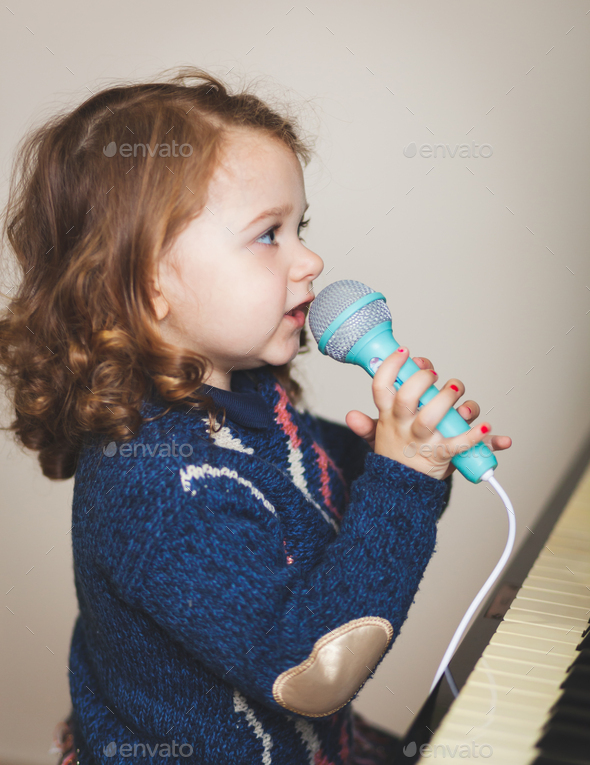 toddler piano and microphone