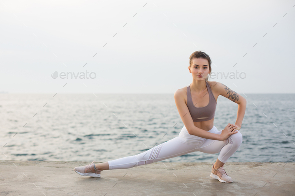 Beautiful girl with long hair and a sports figure posing - stock photo  1682103 | Crushpixel