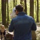 Little Happy Girl And Father With A Child In Their Arms Spend Time In Nature - VideoHive Item for Sale